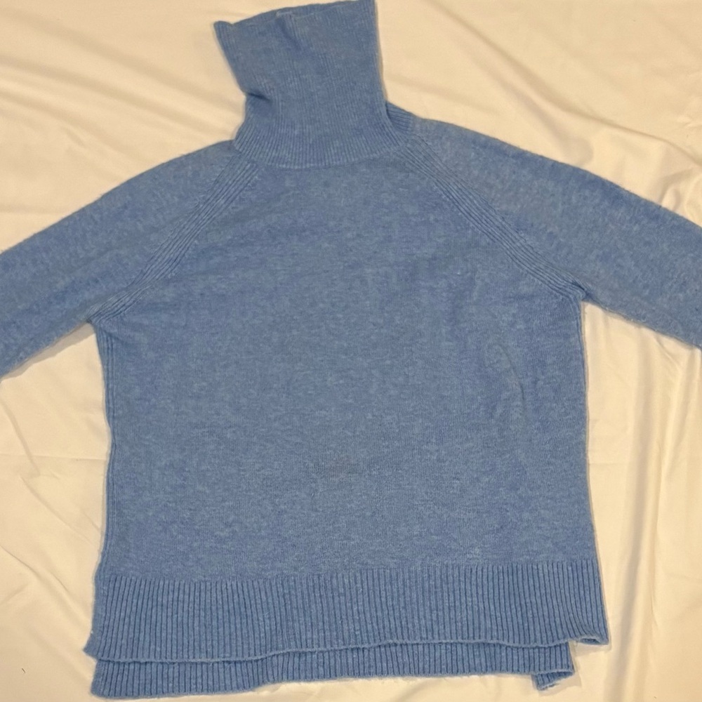 J crew baby blue turtleneck, with slit sides, wool alpaca